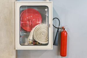 vecteezy_fire-extinguishing-equipment-on-the-wall_2010325 (1) (1)